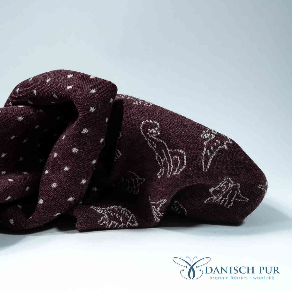 Bio Wolljersey Jacquard Punkte auf Schokokirsch meliert (Merino, kbt, mulesingfrei)