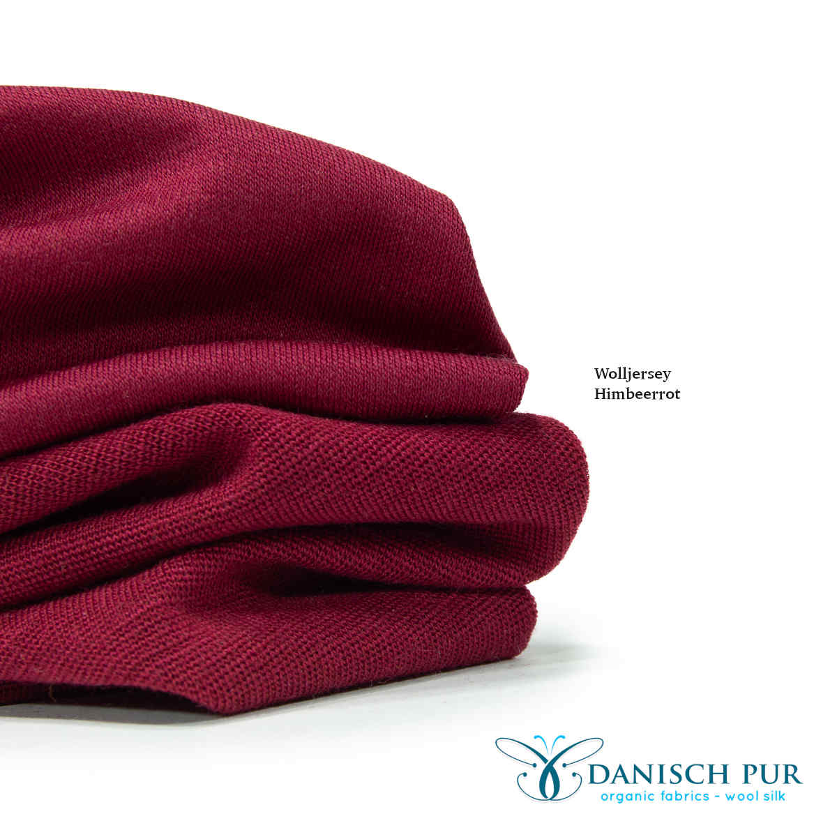 Fine organic wool cuffs light crimson (organic, mulesing-free) in a tube