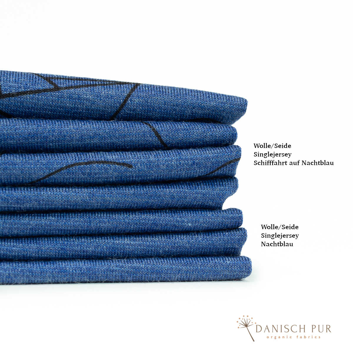 Organic wool silk dandelions on black (kbt, mulesing free) 125cm