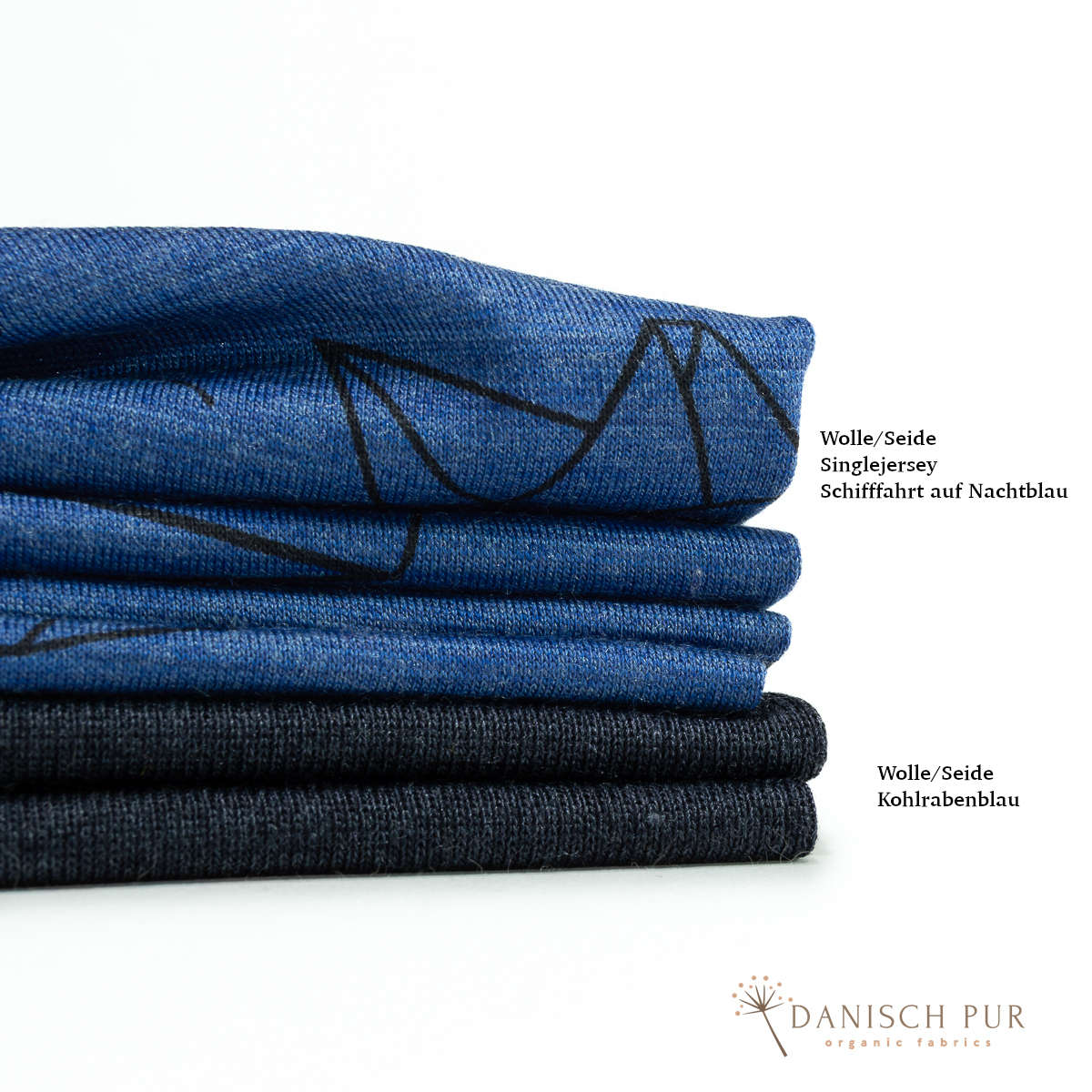 Organic wool silk dandelions on black (kbt, mulesing free) 125cm