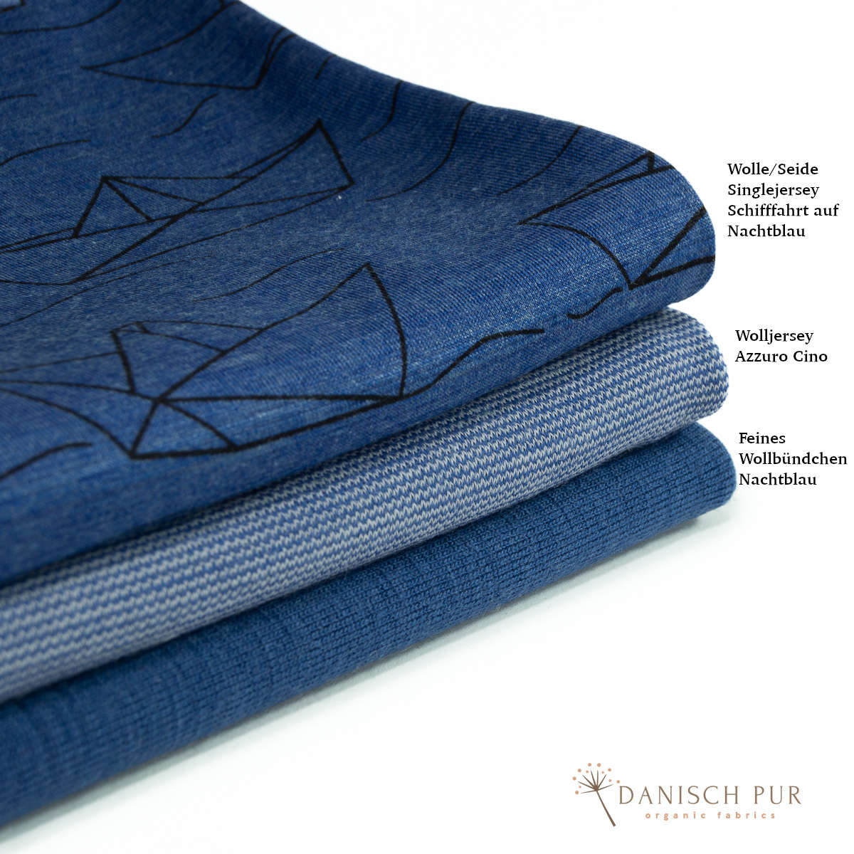 Organic wool silk dandelions on black (kbt, mulesing free) 125cm