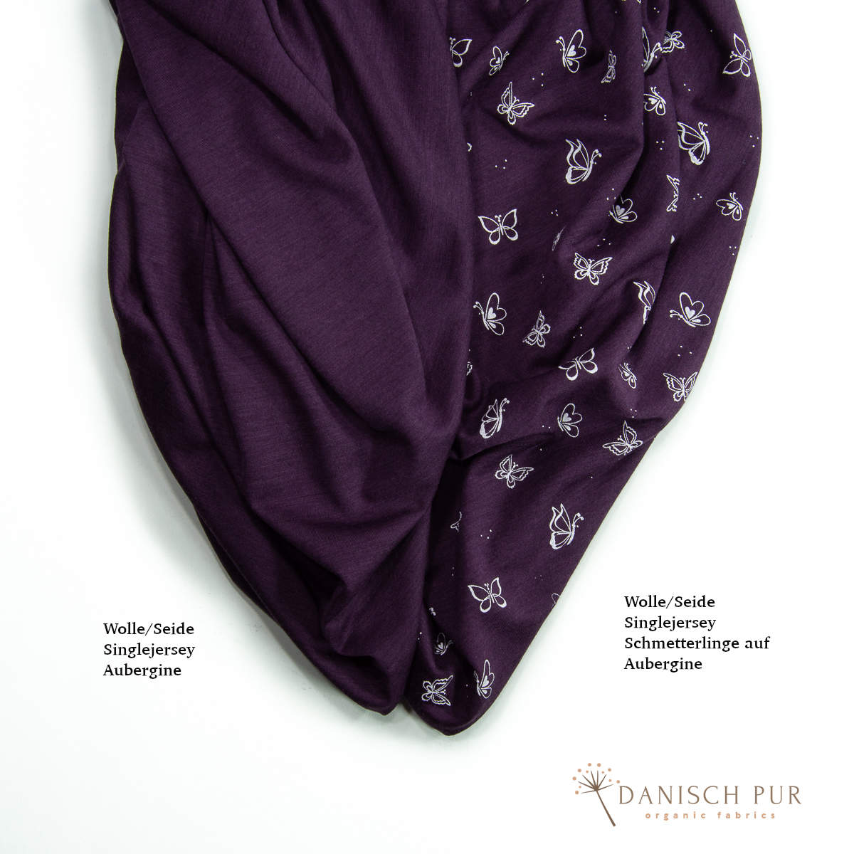 Singlejersey Bio Wolle Seide Schmetterlinge auf Aubergine (70% Schurwolle Merino, kbt, mulesingfrei, 30% Seide)