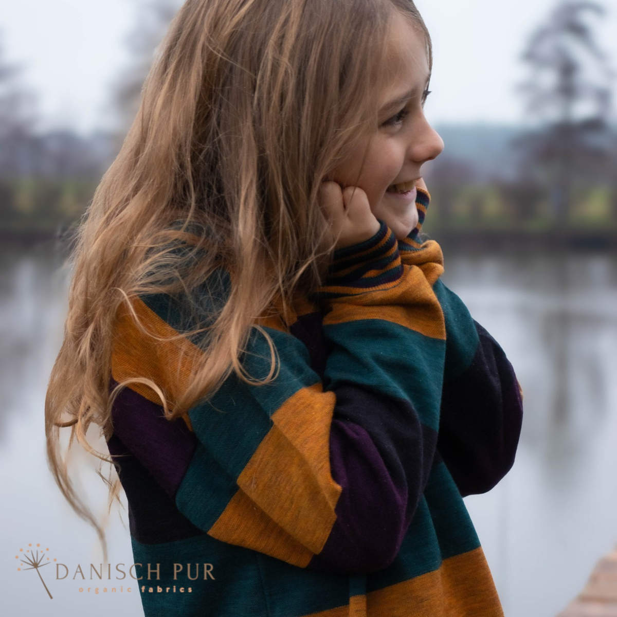 Coupon 100cm Bio Wolljersey Blockstreifen Jacquard Schwarz-Aubergine-Gold-Petrol meliert (100% Schurwolle, Merino, kbt, mulesingfrei)