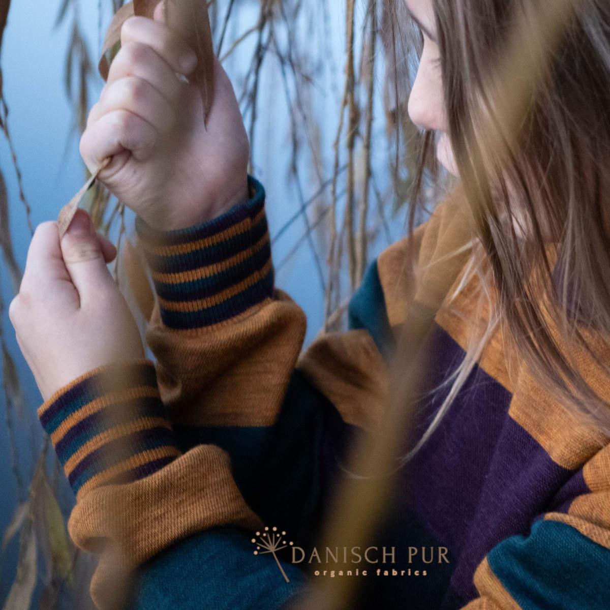 Coupon 100cm Bio Wolljersey Blockstreifen Jacquard Schwarz-Aubergine-Gold-Petrol meliert (100% Schurwolle, Merino, kbt, mulesingfrei)