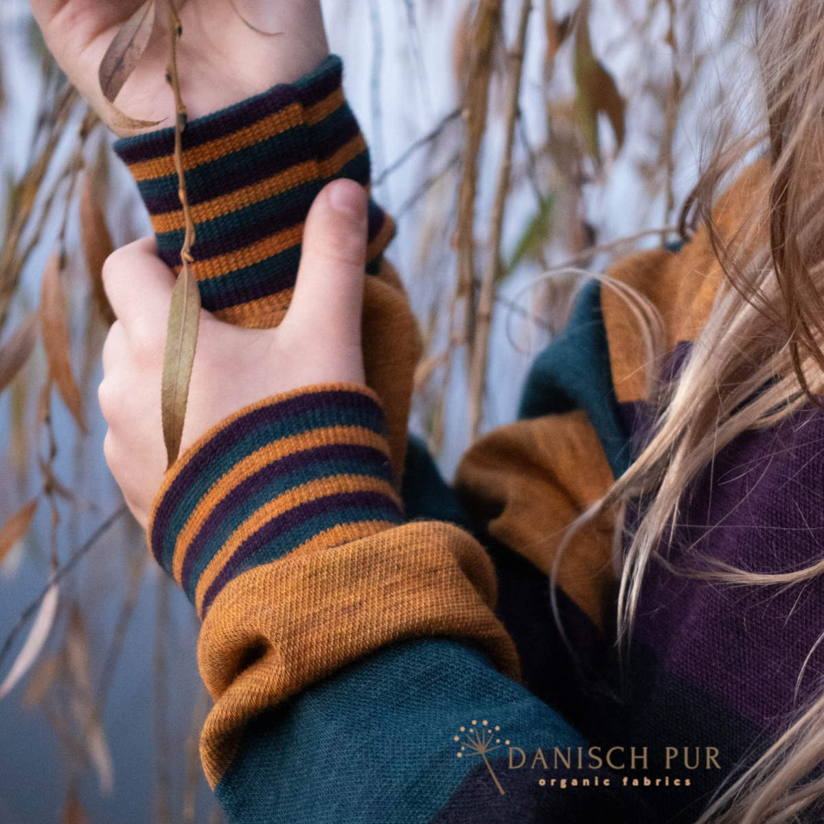 Coupon 100cm Bio Wolljersey Blockstreifen Jacquard Schwarz-Aubergine-Gold-Petrol meliert (100% Schurwolle, Merino, kbt, mulesingfrei)