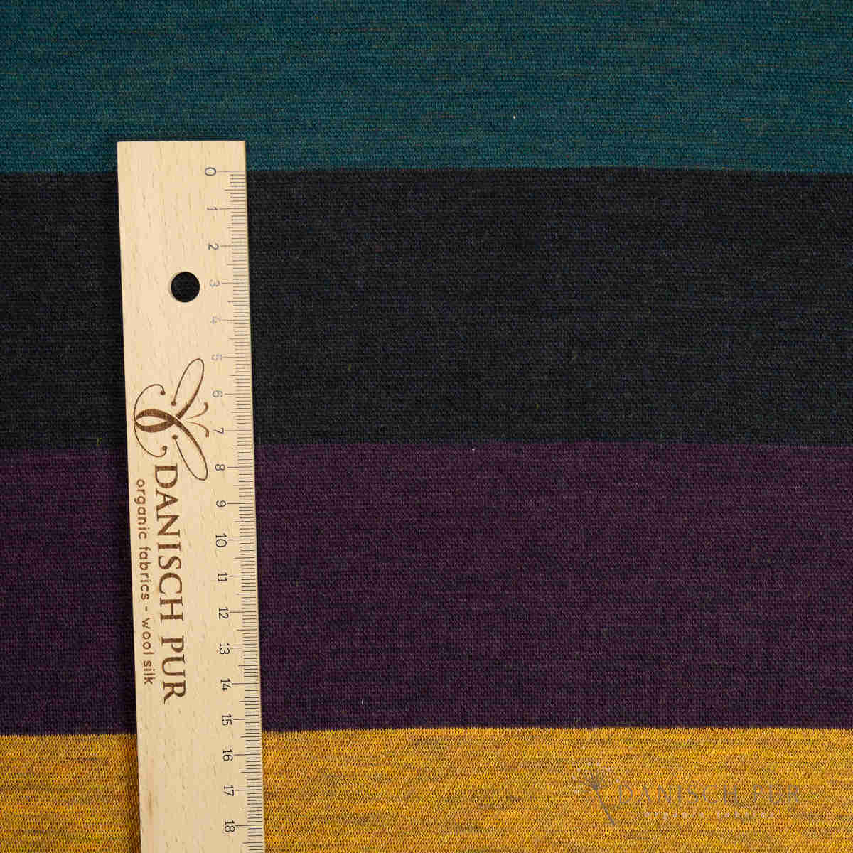 Coupon 100cm Bio Wolljersey Blockstreifen Jacquard Schwarz-Aubergine-Gold-Petrol meliert (100% Schurwolle, Merino, kbt, mulesingfrei)