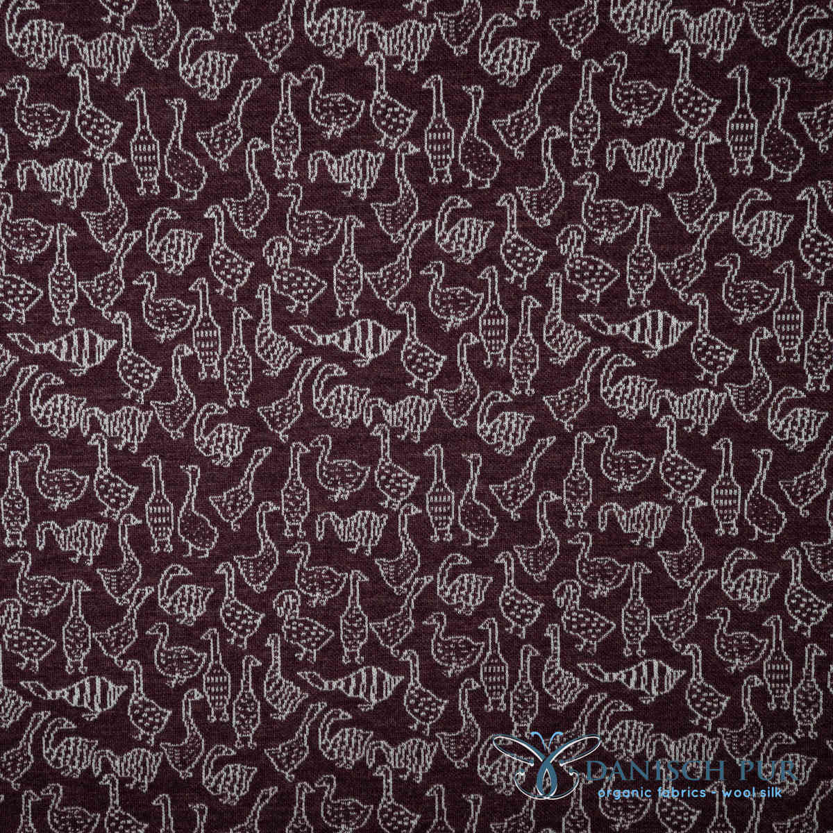 Bio Wolljersey Jacquard Gänse auf Schokokirsch meliert (Merino, kbt, mulesingfrei)