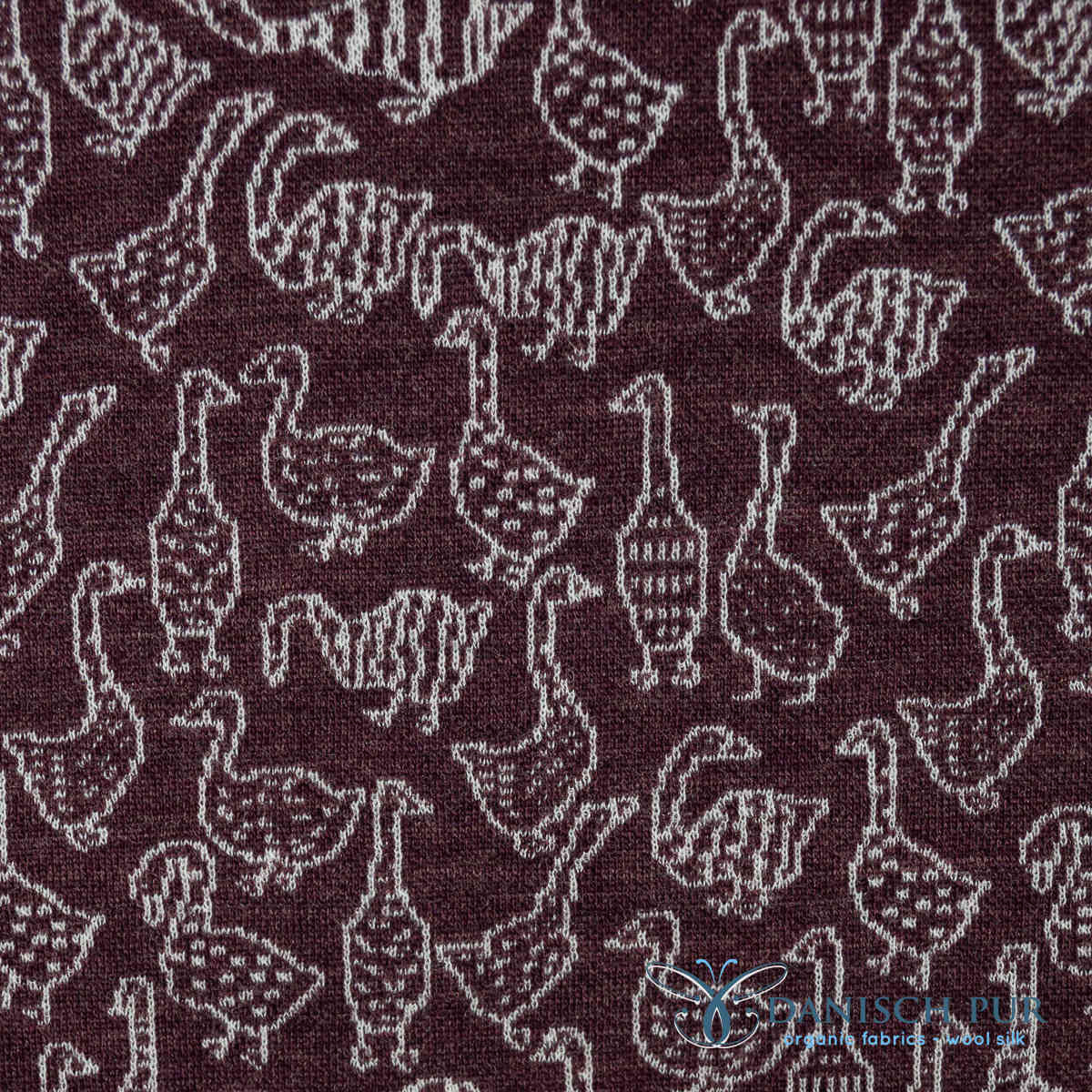 Bio Wolljersey Jacquard Gänse auf Schokokirsch meliert (Merino, kbt, mulesingfrei)
