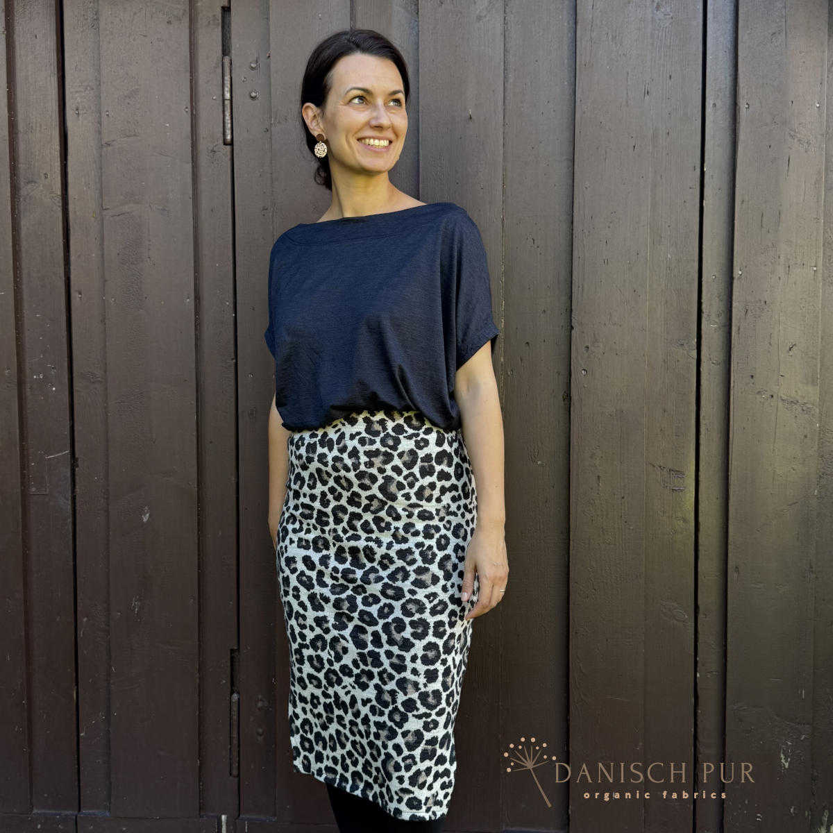 Organic wool jersey jacquard clouds lagoblau-petrol on ecru melange V3 (Merino, kbt, mulesing-free)