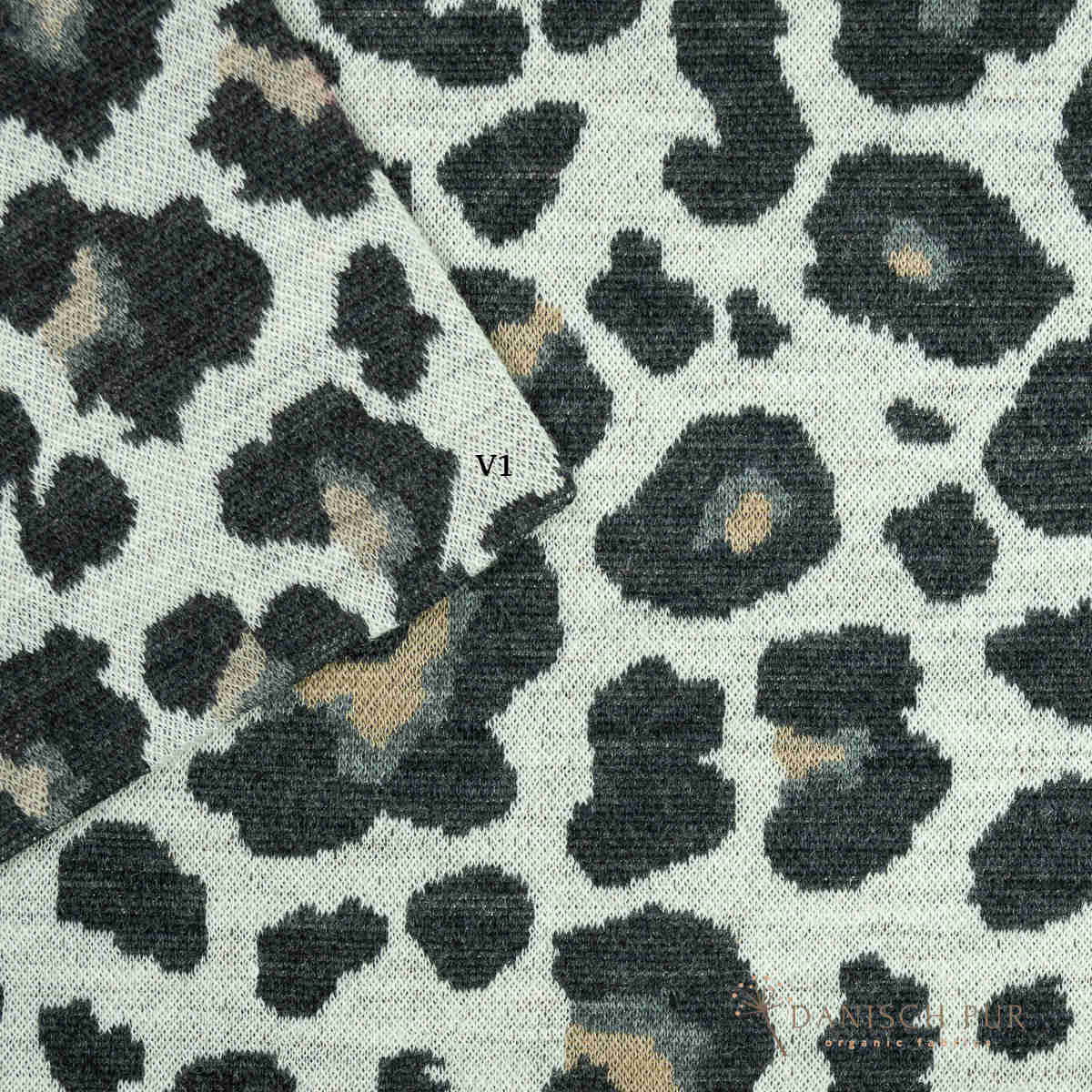 Coupon 40 cm Bio Wolljersey Jacquard Leo auf Ecru  (Merino, kbt, mulesingfrei)