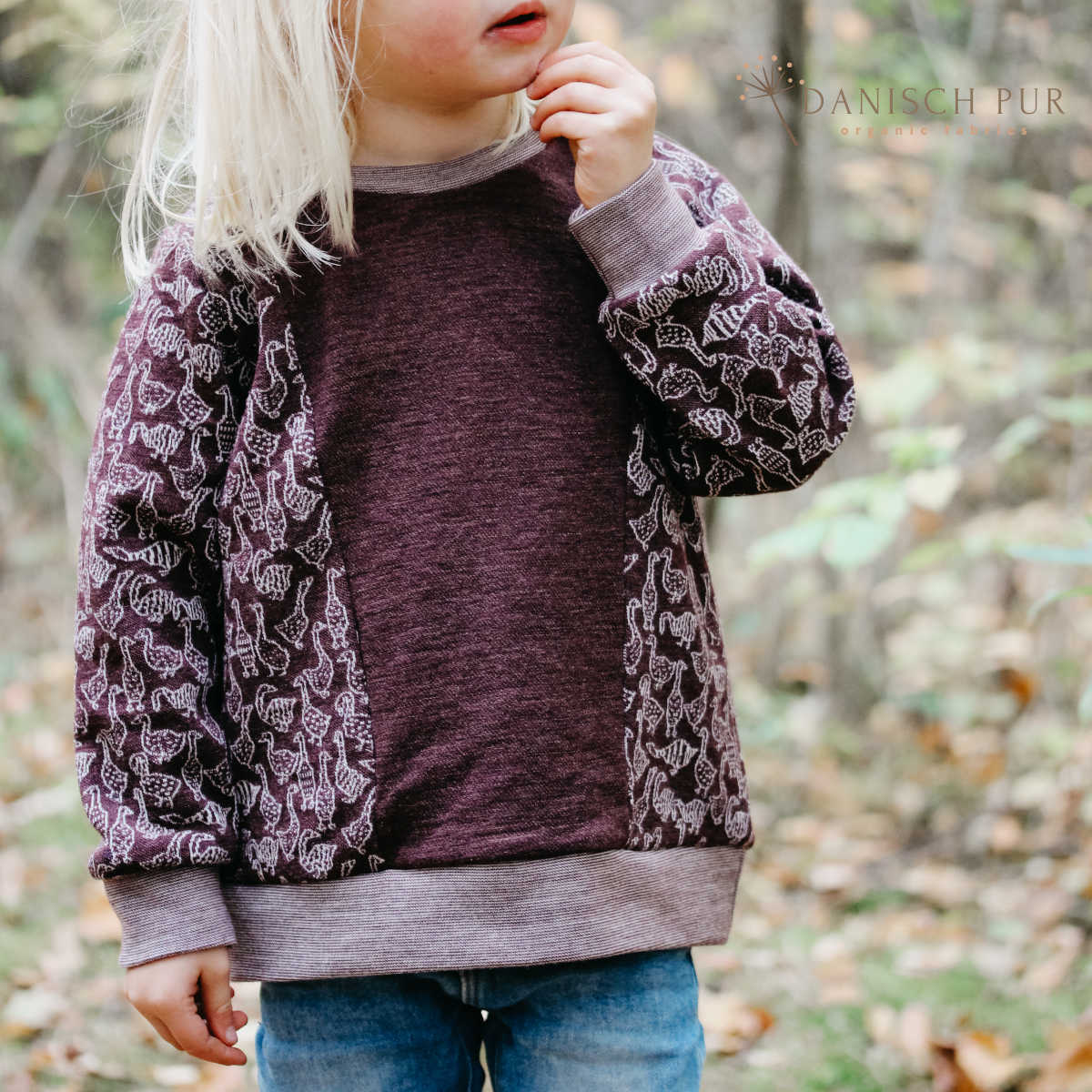 Bio Wolljersey Jacquard Gänse auf Schokokirsch meliert (Merino, kbt, mulesingfrei)