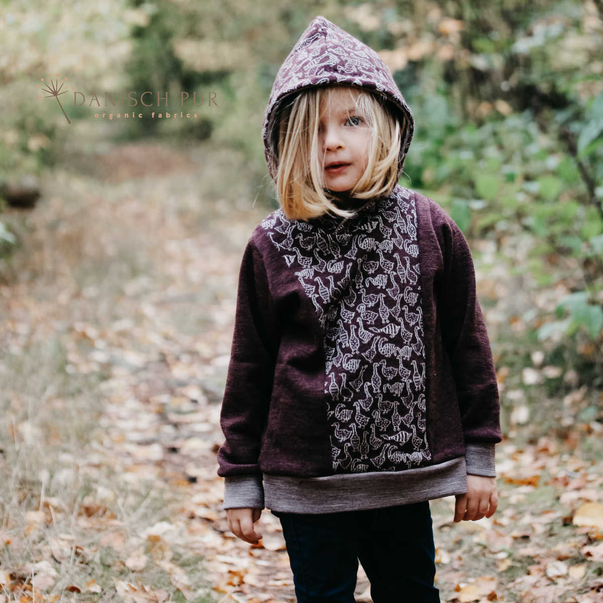 Bio Wolljersey Jacquard Gänse auf Schokokirsch meliert (Merino, kbt, mulesingfrei)