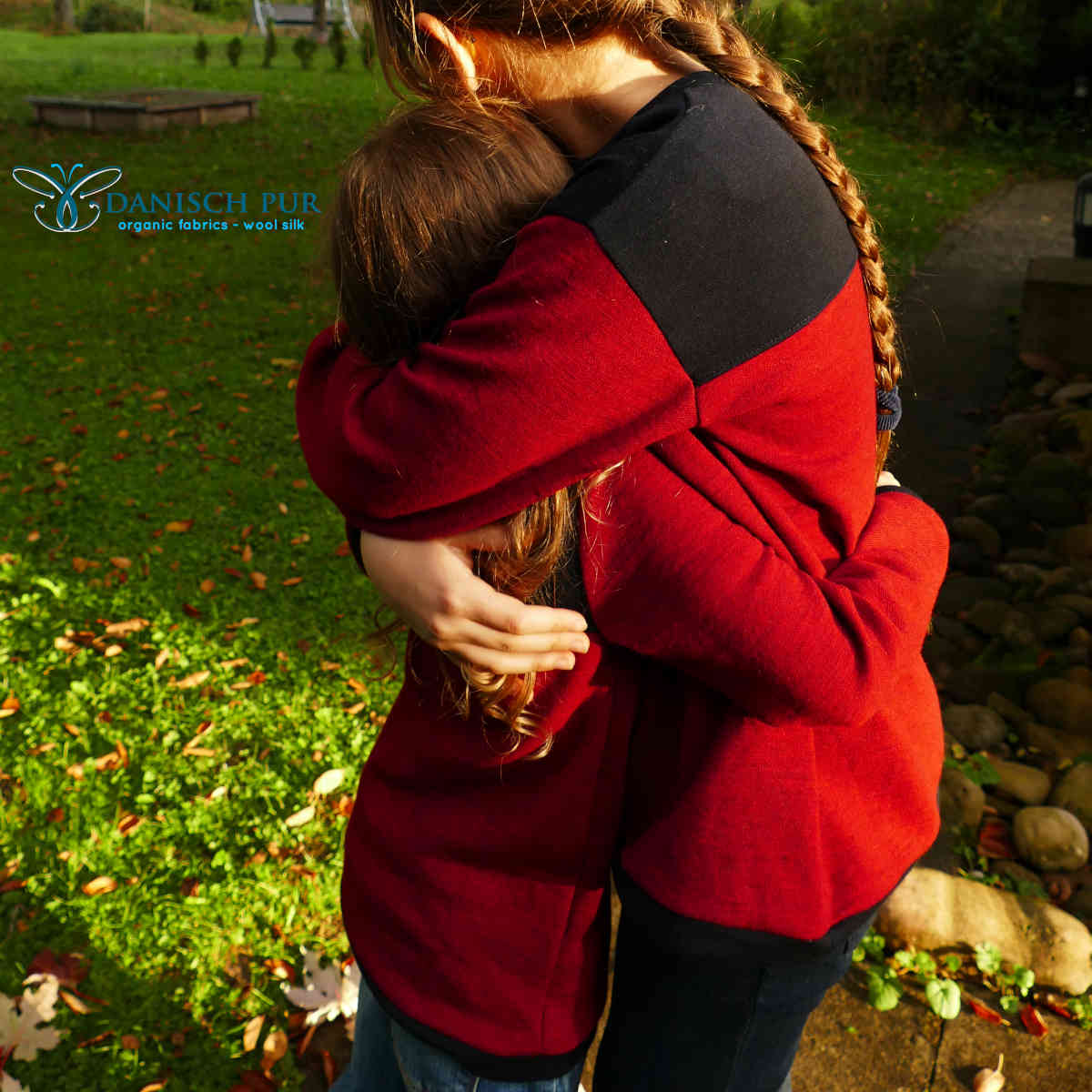 Organic wool jersey jacquard plain red mottled (Merino, kbt, mulesing-free)