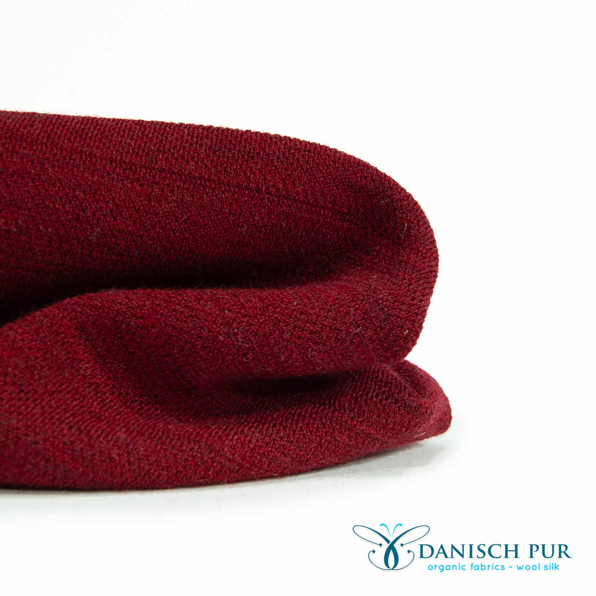 Organic wool jersey jacquard plain red mottled (Merino, kbt, mulesing-free)