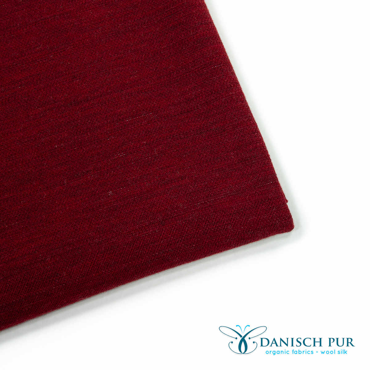 Organic wool jersey jacquard plain red mottled (Merino, kbt, mulesing-free)